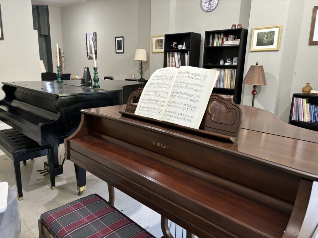 Two grand pianos inside of Music Corner STL's studio on West Pine Blvd in St. Louis, MO